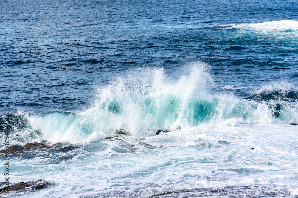 Fototapeta premium waves crashing against the rocks in the atlantic ocean in the town of Baiona, Galicia, Spain