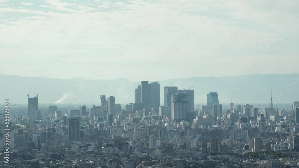 NAGOYA, JAPAN - OCTOBER 2022 : Aerial high angle view of NAGOYA CITY in sunny daytime. View of buildings and street traffic around Nagoya station and Sakae area (central downtown). NAGOYA, JAPAN - OCTOBER 2022 : Aerial high angle view of NAGOYA CITY in sunny daytime. View of buildings and street traffic around Nagoya station and Sakae area (central downtown).