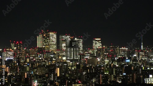 Wallpaper Mural NAGOYA, JAPAN - OCTOBER 2022 : Aerial high angle view of NAGOYA CITY at night. View of buildings and street traffic around Nagoya station and Sakae area (central downtown). Torontodigital.ca