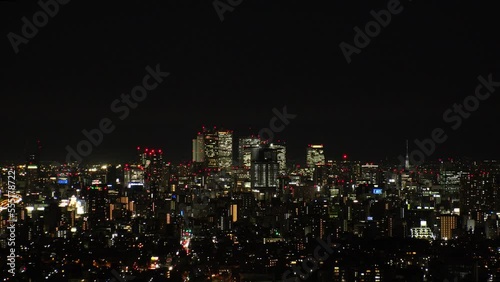 Wallpaper Mural NAGOYA, JAPAN - OCTOBER 2022 : Aerial high angle view of NAGOYA CITY at night. View of buildings and street traffic around Nagoya station and Sakae area (central downtown). Torontodigital.ca