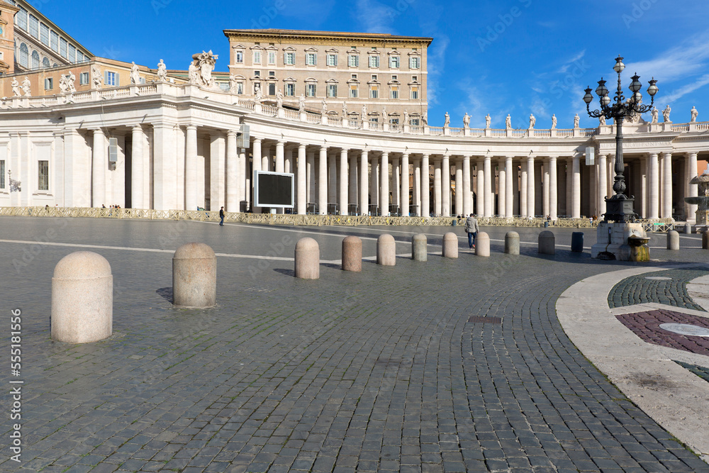 Colonnade on St.Peter's Square in front of Saint Peter's Basilica. Deserted square due to the Covid-19 coronovirus pandemic, Vatican, Rome, Italy