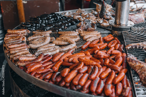 Grilled sausage on street market.