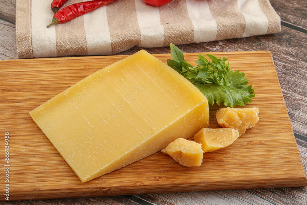 Parmesan hard cheese with small pieces Parmesan hard cheese with small pieces