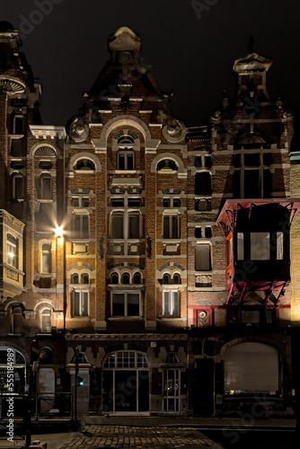 Illuminated 19th century houses in eclectic style, , at night in the famous Baudelo street in Ghent, 28 January 2021 