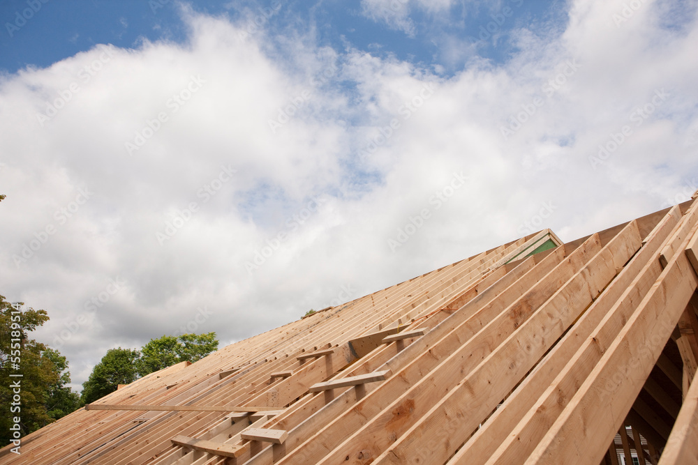 Roof rafters of a house under construction Roof rafters of a house under construction