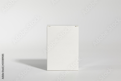 Mockup of a white box of parapharmacy product, standing, includes tracing