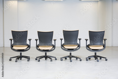 View of empty office chairs.
