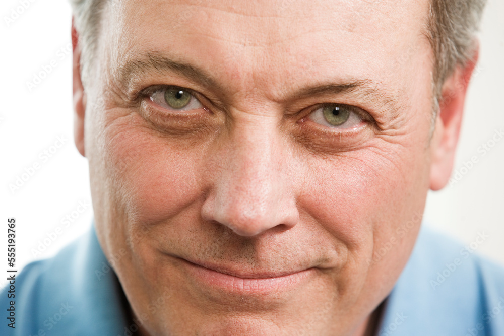 Portrait of a smiling mature man. Portrait of a smiling mature man.