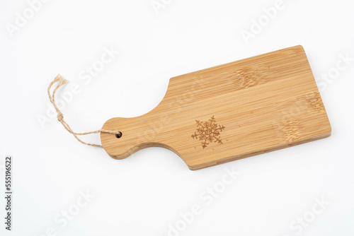 Small Snowflake cutting board for christmas on white background, isolated