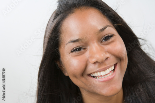 Close-up of a teenage girl smiling photo