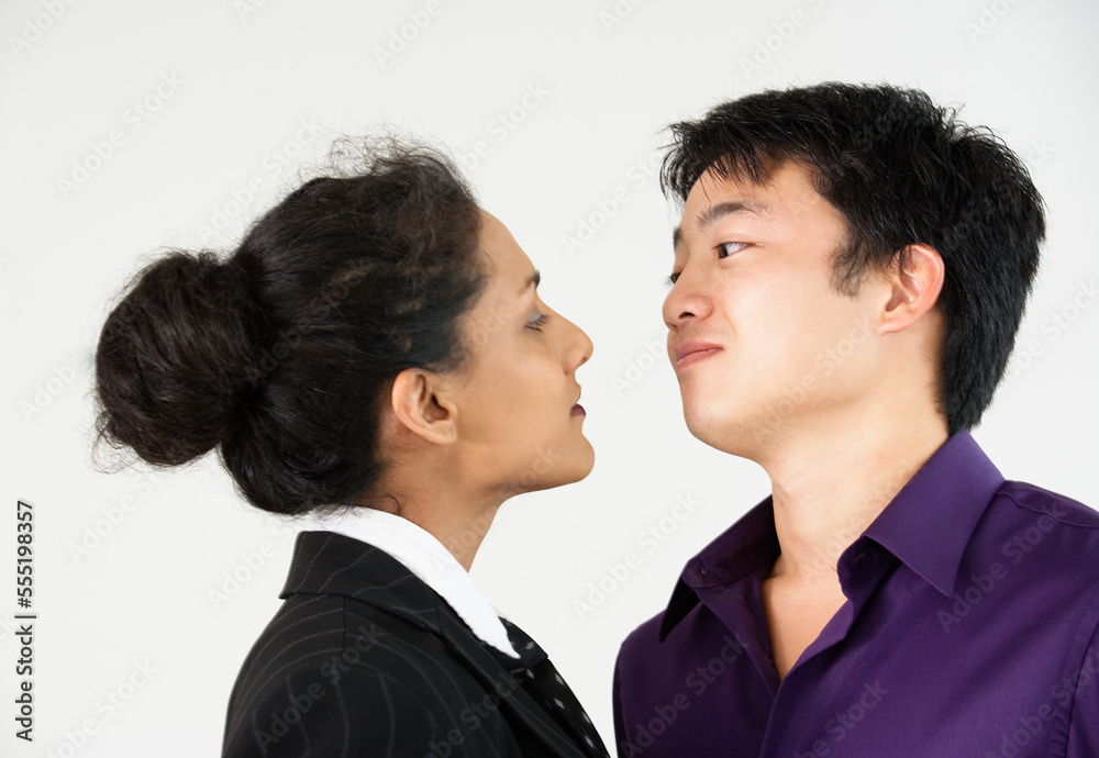 View of two executives looking at each other.