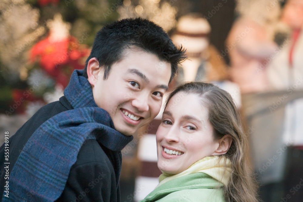 Portrait of a young couple smiling Portrait of a young couple smiling