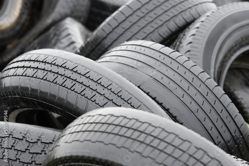 Piles of wet rubber tires. photo