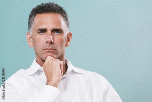 Portrait of a mid adult man thinking