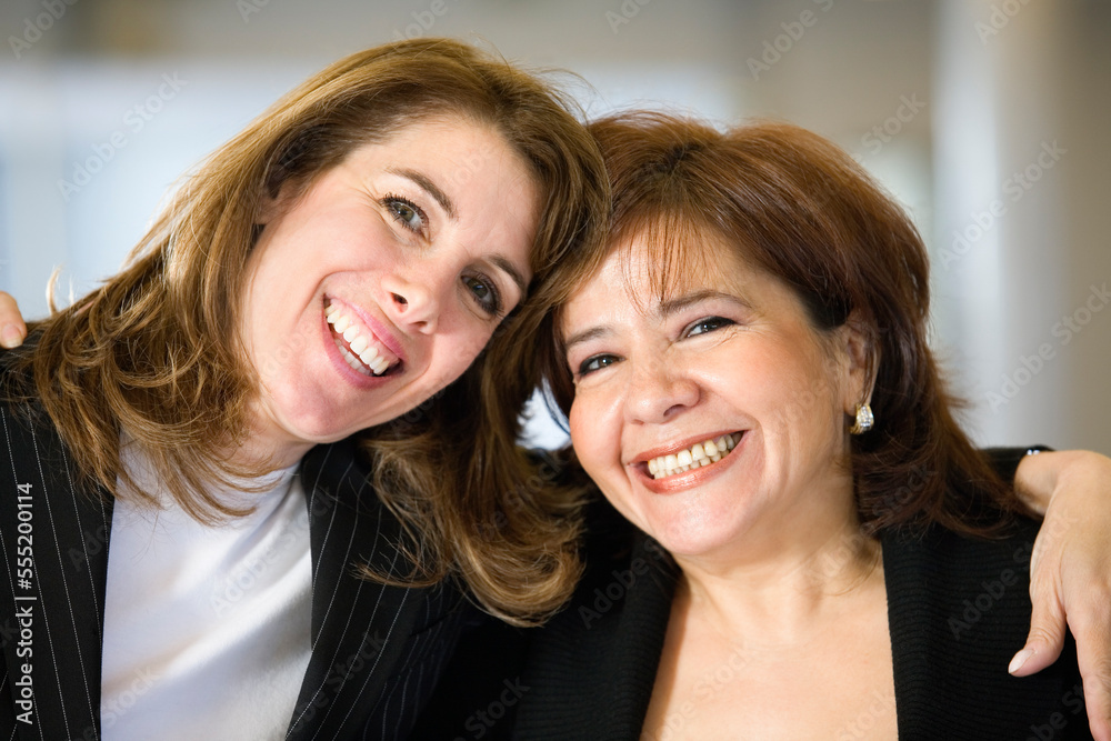 Portrait of two smiling women. Portrait of two smiling women.