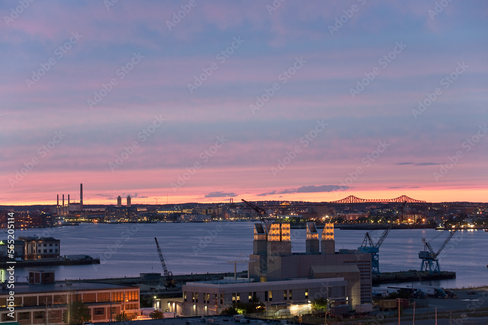 Cranes at a harbor with a bridge in the background, Tobin Bridge, Boston Harbor, Charlestown, Boston, Massachusetts, USA Cranes at a harbor with a bridge in the background, Tobin Bridge, Boston Harbor, Charlestown, Boston, Massachusetts, USA