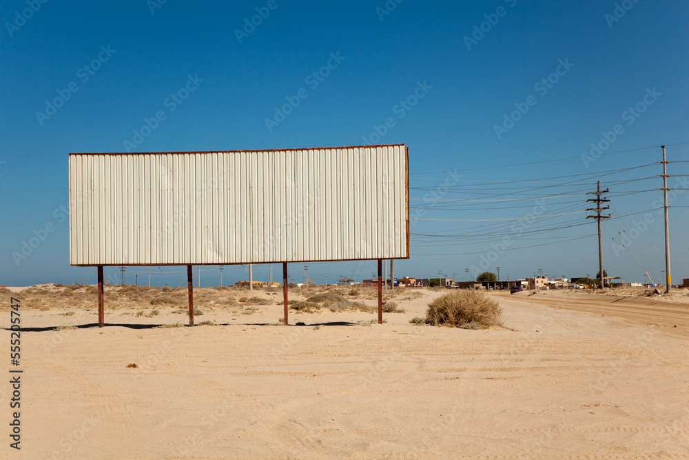 Blank billboard in the middle of desert landscape Blank billboard in the middle of desert landscape
