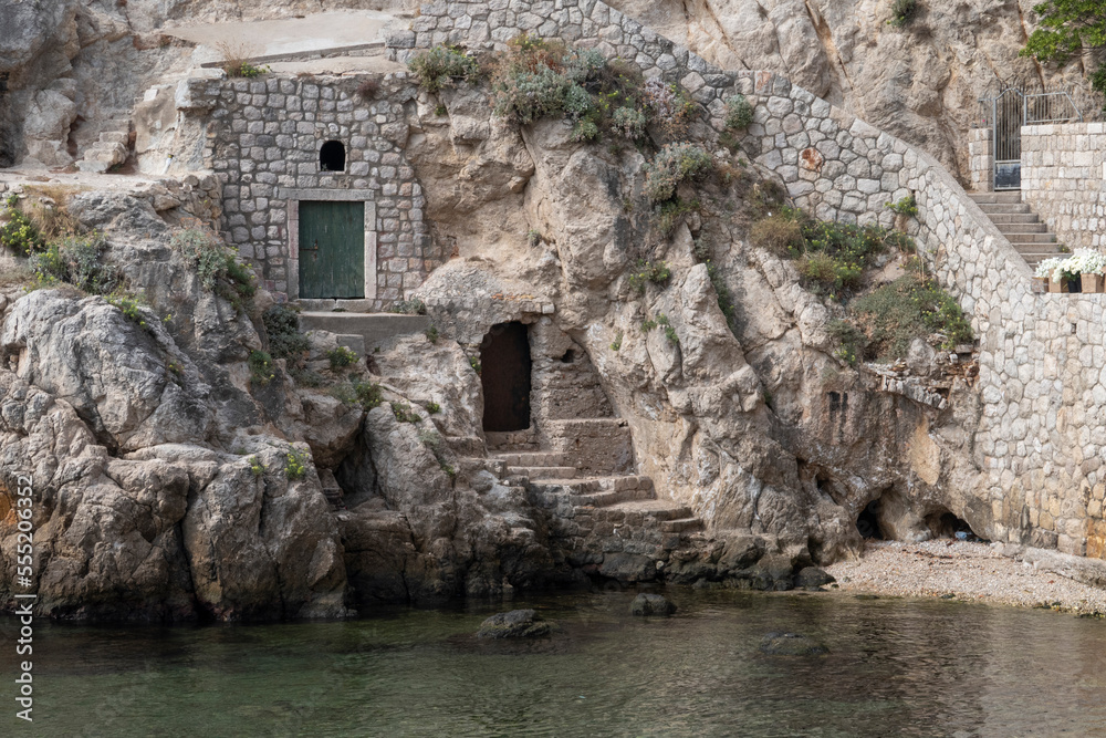 Two old doors in a cliff in a bay in Dubrovnik