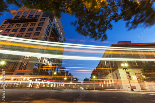 Cars on the street at dusk, Tremont Street, Berkeley Street, Boston, Massachusetts, USA photo