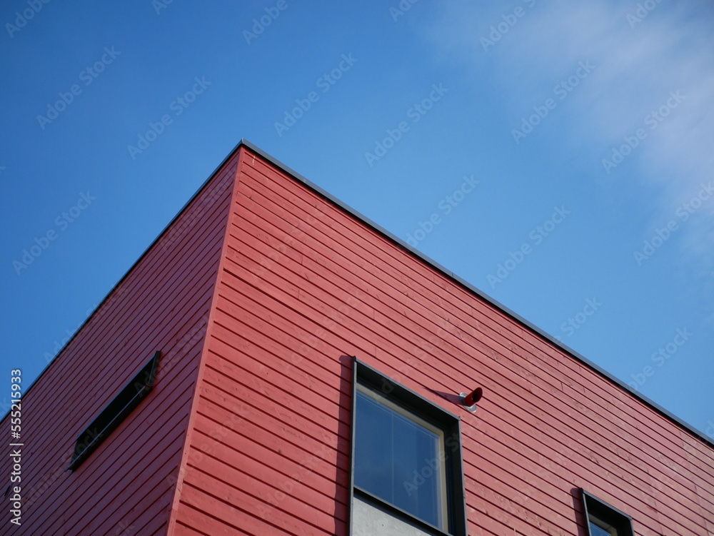 red building and blue sky