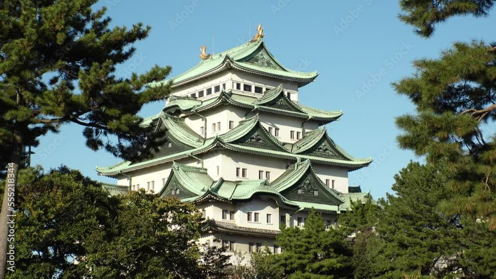 NAOGYA, JAPAN - OCTOBER 2022 : Scenery of Nagoya castle in sunny daytime. Travel, tourism and history concept video. NAOGYA, JAPAN - OCTOBER 2022 : Scenery of Nagoya castle in sunny daytime. Travel, tourism and history concept video.