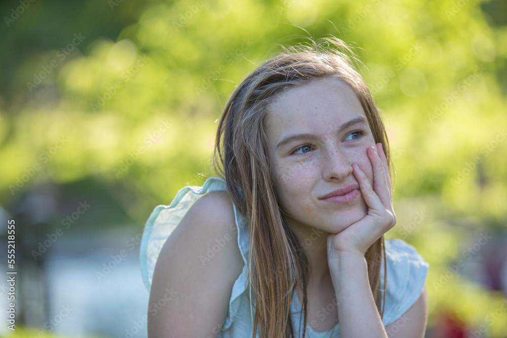 Portrait of happy Hispanic teen girl in park Portrait of happy Hispanic teen girl in park
