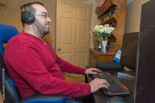 Man with Visual Impairment at his keyboard using a screen reader
