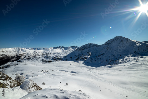 snowy mountains landscape with a sky track.