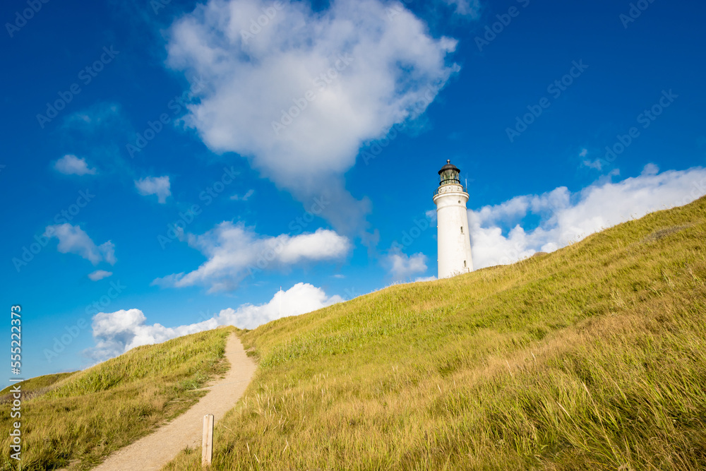 An old white lighthouse in Frederikshavn, hritshals, Denmark build during World War An old white lighthouse in Frederikshavn, hritshals, Denmark build during World War