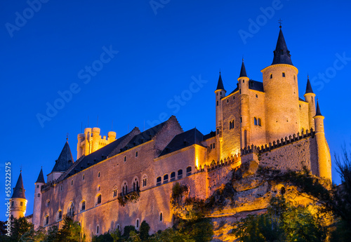 Alcazar of Segovia illuminated at dusk; Segovia, Castile and Leon, Spain