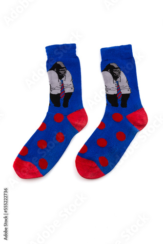 Pair of blue socks with monkeys