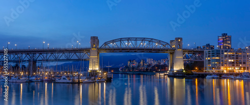 Granville Street Bridge to Granville Island at dusk; Vancouver, British Columbia, Canada photo