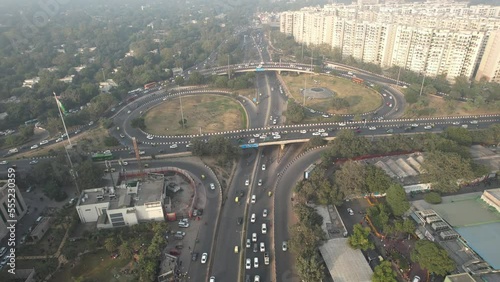 Aerial Drone footage of a Roundabout Flyover Road Intersection Traffic in Delhi India photo