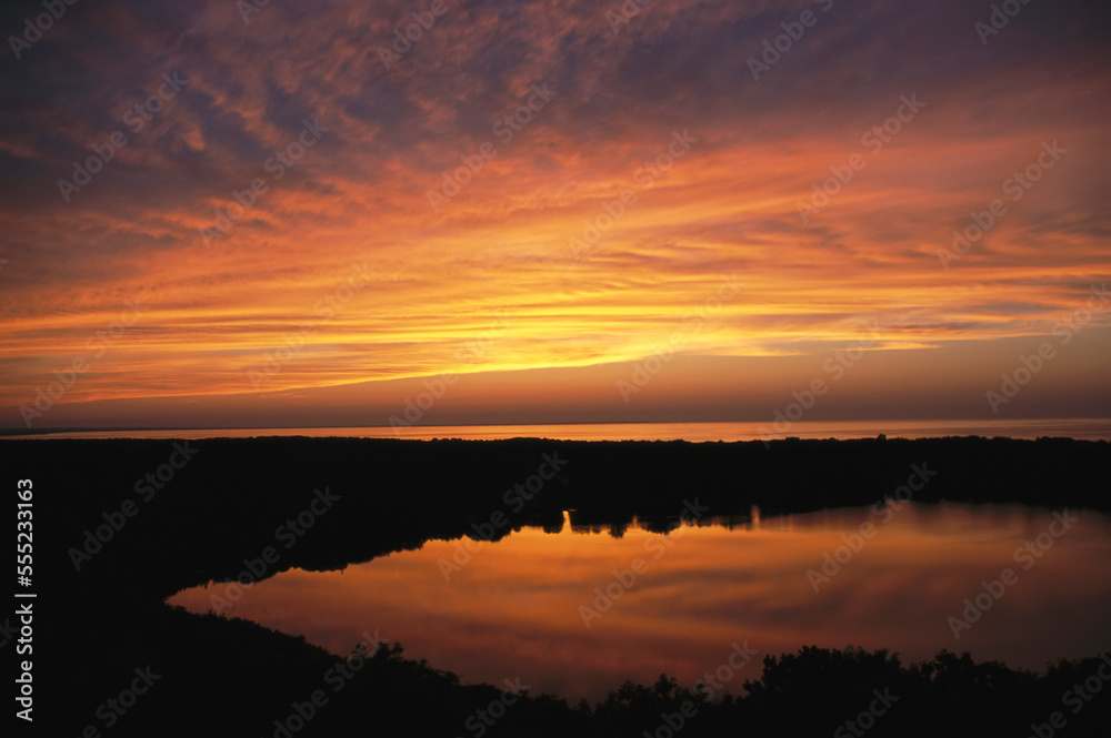 Sunset seen from Scargo tower, tallest point in Cape Cod.; Dennis, Cape Cod, Massachusetts.