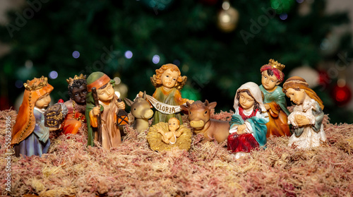 Obraz na plátně More traditional christian christmas nativity scene with blurred background of d