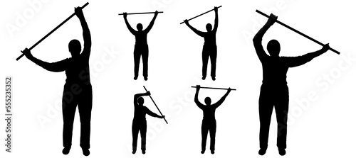 Physical exercise for older seniors. An elderly woman with a stick in her hands is engaged in gymnastics. Hands up with a gymnastic stick. Front view. Woman silhouette in black isolated on white.