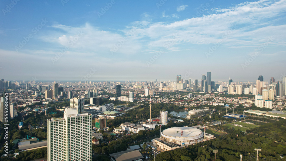 Aerial view of the Indonesia Parliament Complex, which is also known as the DPR or MPR building with Jakarta cityscape. 