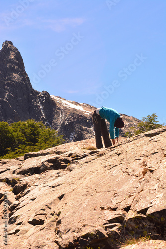 woman stretching in the mountains. outdoor exercise