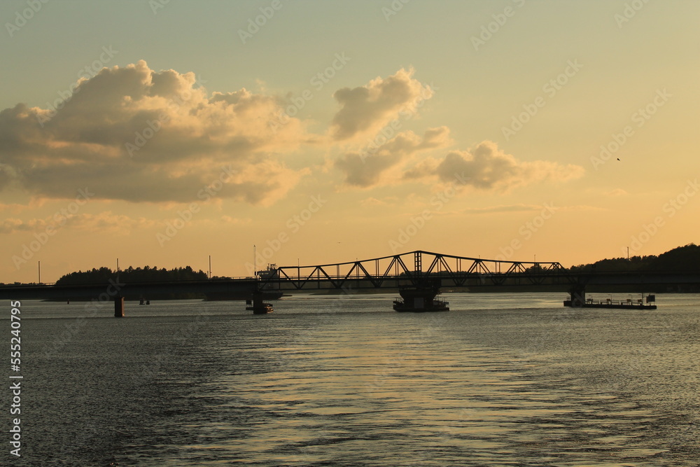 Swing bridge near Ridön island, Mälaren lake, Sweden. Panoramic view from a sailing boat. Construction, transportation, navigation