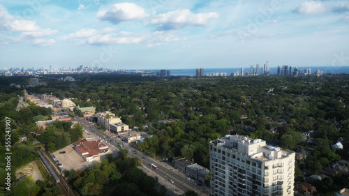 Aerial view over Bloor Street West in the Kingsway neighborhood of Toronto, Ontario, Canada. Looking southeast towards the downtown core Toronto skyline, Mimico and Lake Ontario. photo