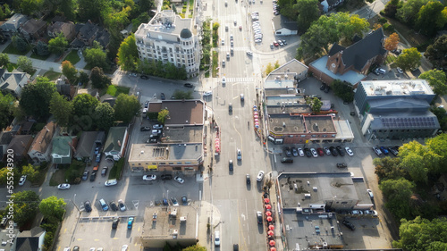 Aerial view overhead of Bloor Street West in western Toronto, Ontario, Canada looking west during late summer afternoon. photo