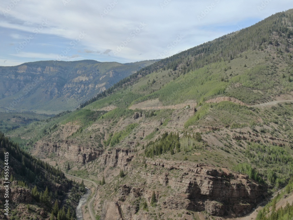 High aerial above Minturn Colorado mountains and Eagle River