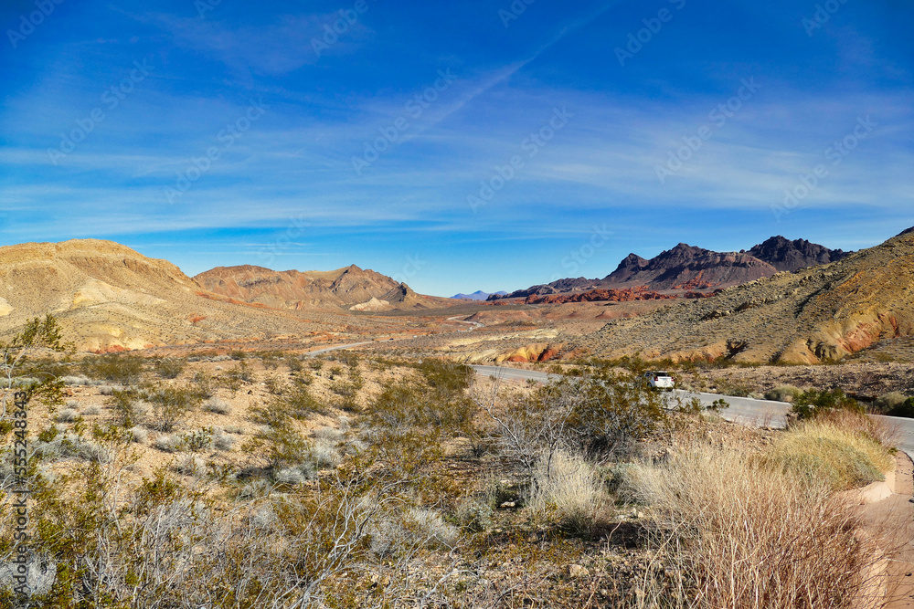 Road through the desert with red, yellow and black rocks in Valley of Fire State Park, Nevada, USA.
Road through the desert with red, yellow and black rocks in Valley of Fire State Park, Nevada, USA.