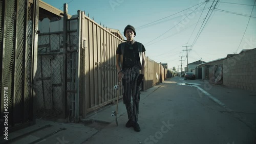 Mexican American Punk Rocker Skateboarder Portrait  Wide Shot photo