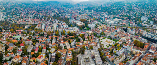 Aerial view around the capital city Sarajevo in Bosnia and Herzegovina on a cloudy and foggy day in autumn. 