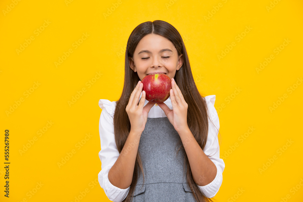 Fresh fruit. Teenager girl hold apples on yellow isolated studio background. Child nutrition. Fresh fruit. Teenager girl hold apples on yellow isolated studio background. Child nutrition.