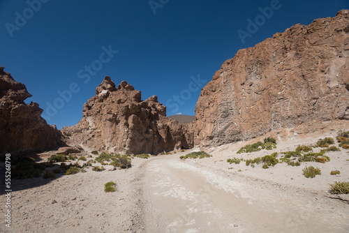 deserted dirt road with mountains as beautiful wallpaper, landscape with sunlight, natural ecosystem