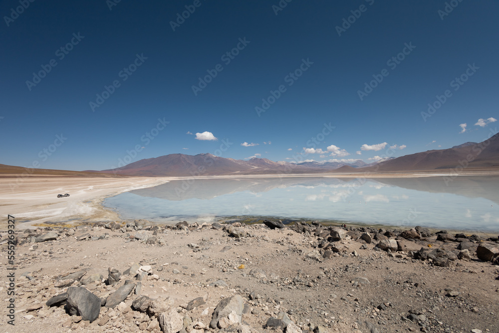 natural landscape wallpaper with a lake and majestic mountain, tourist destination in the day, quiet place