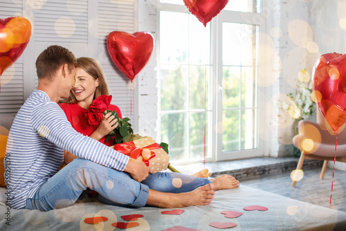 Young couple with red roses...