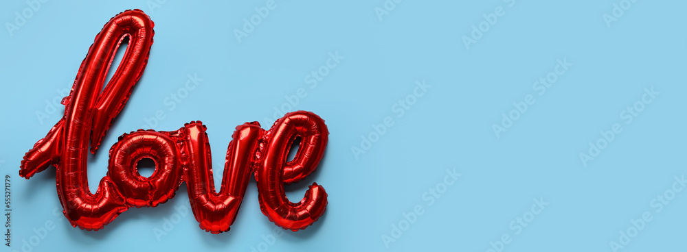 Balloon in shape of word LOVE on light blue background with space for text. Valentine's Day celebration Balloon in shape of word LOVE on light blue background with space for text. Valentine's Day celebration